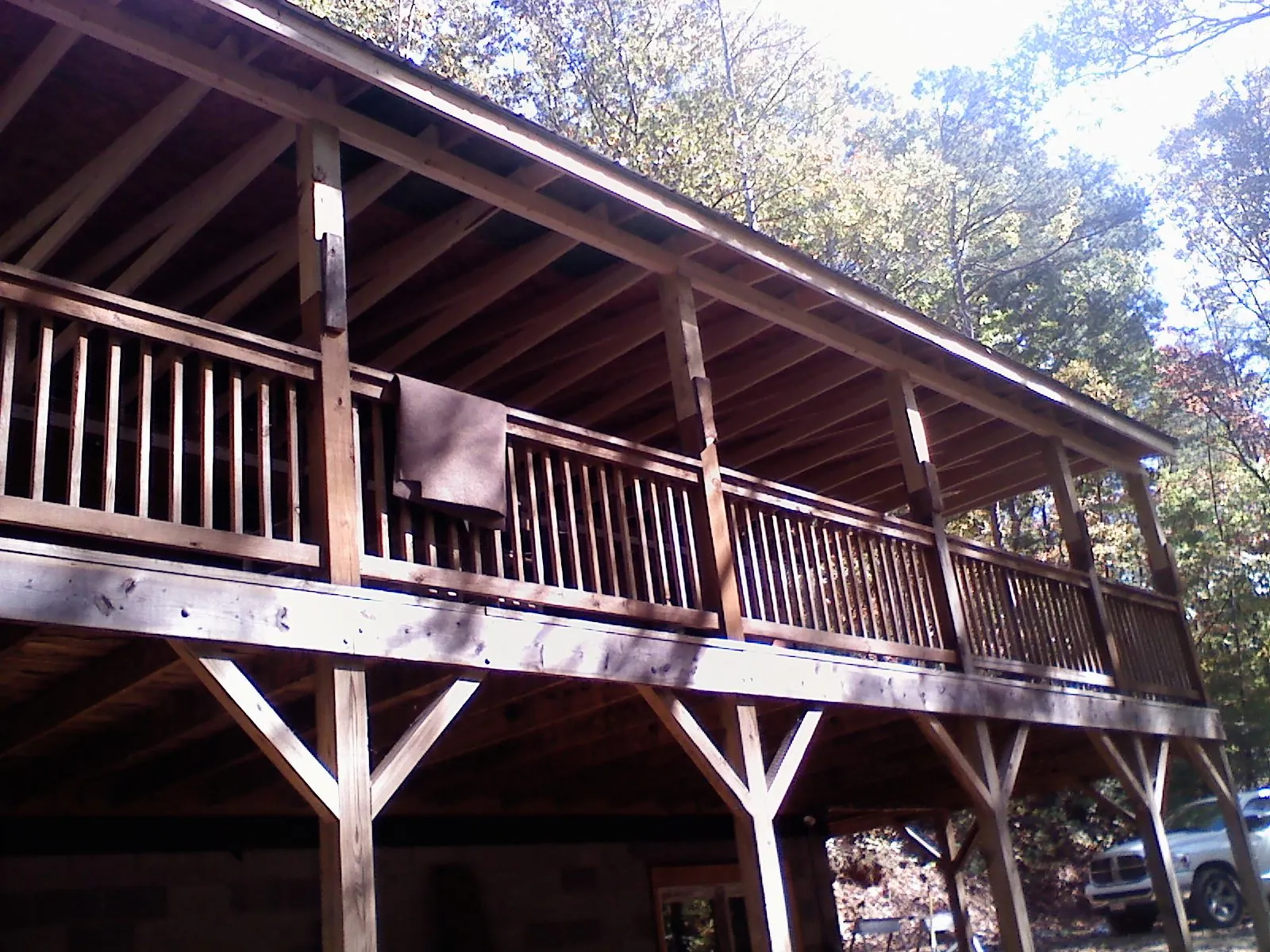 Timber framing under a new elevated porch and deck — Roof Leak Repair in Loa by Roofing Brothers